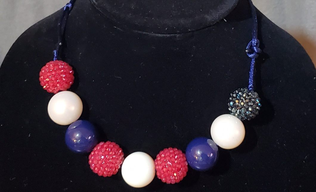 Navy blue, white, and deep red,